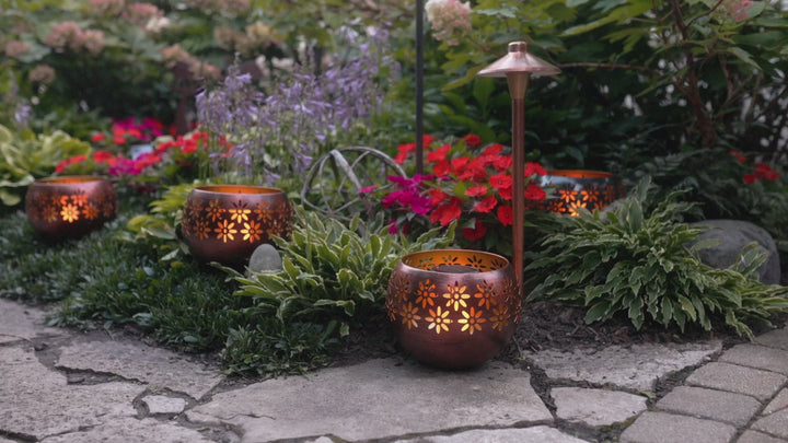 video of solar fire bowls in use in a garden space